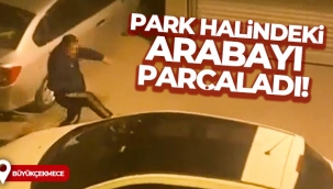 Büyükçekmece'de park halindeki bir arabayı parçalayan şahıs kamerada