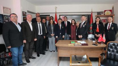 Karşıyaka’da gaziler ve şehit ailelerine anlamlı ziyaret